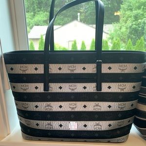 MCM Tote-Large retail price $895 when purchased now going for $950. Like new!!